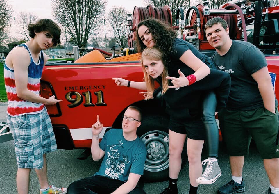 TTKH taking a picture with a firetruck