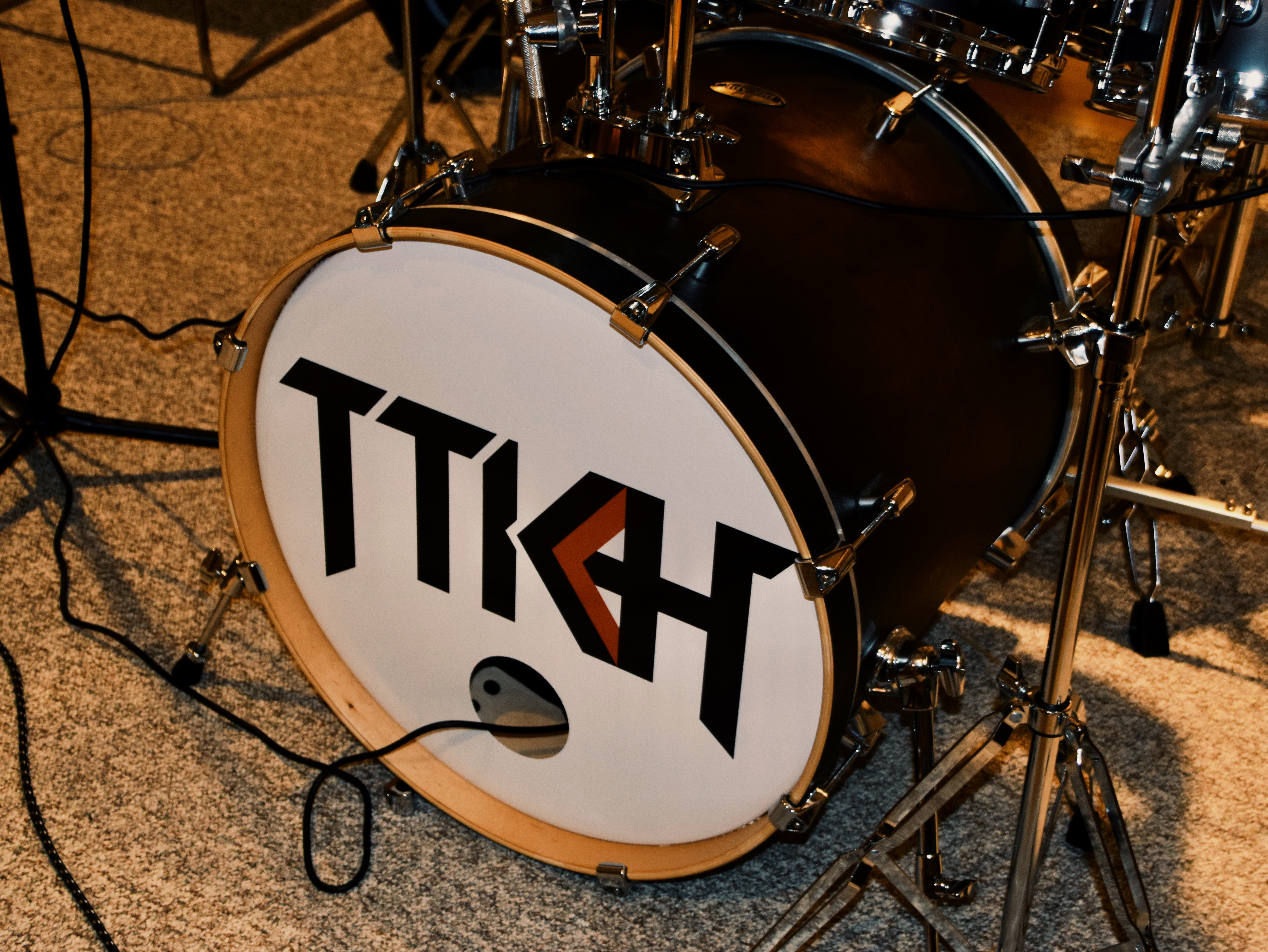 Close up of the kick drum with the TTKH logo on it